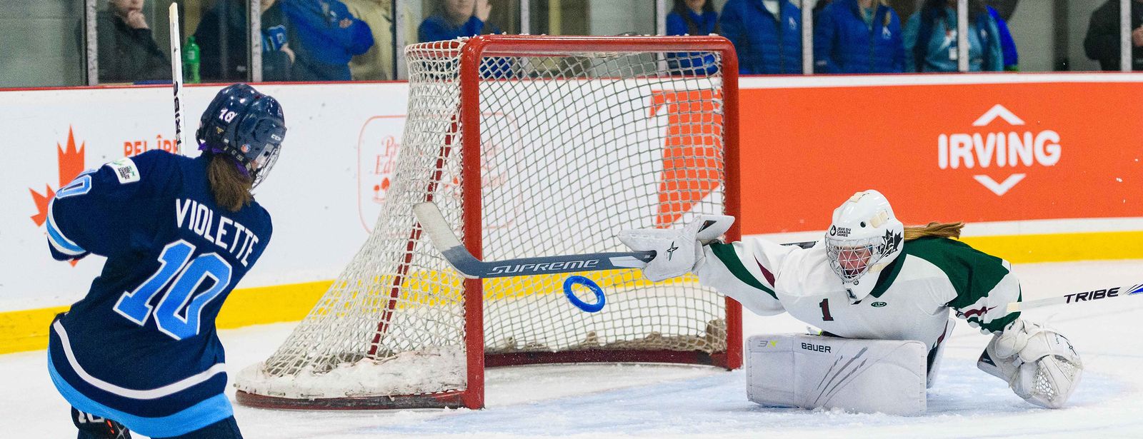 Sam Jacks with ringette players